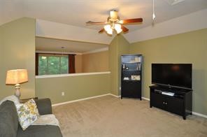 14107 Spring Mountain Lane Houston, TX 77044 - Photo 10 of 13 Upstairs family room open to first floor