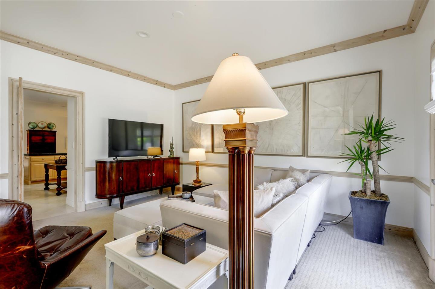 85 Clarendon Road Pacifica, CA 94044 - Photo 23 of 74 a living room with furniture and a flat screen tv