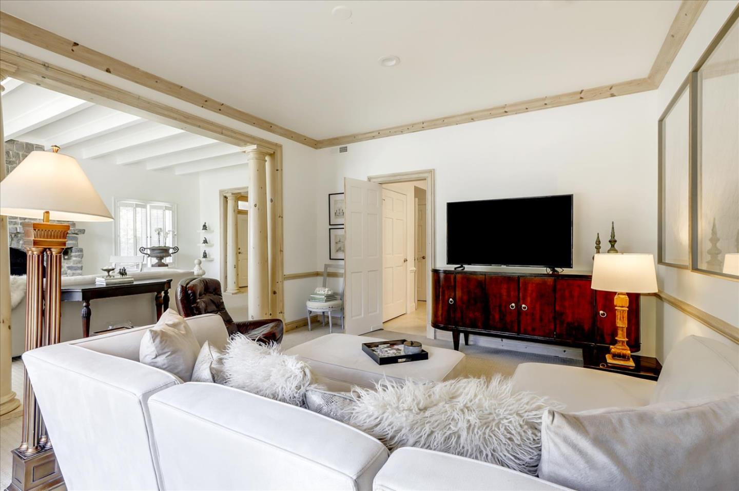 85 Clarendon Road Pacifica, CA 94044 - Photo 24 of 74 a living room with furniture and a flat screen tv