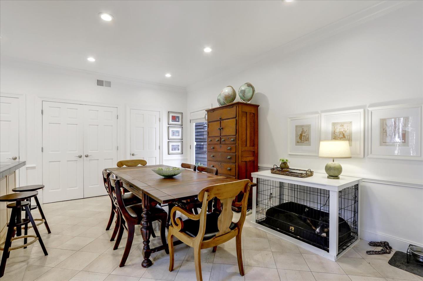 85 Clarendon Road Pacifica, CA 94044 - Photo 32 of 74 a dining room with a stove a table and chairs