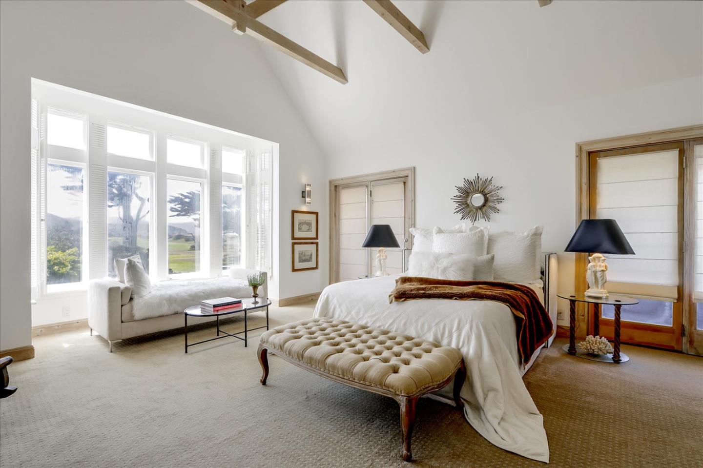 85 Clarendon Road Pacifica, CA 94044 - Photo 50 of 74 a bedroom with furniture and a large window