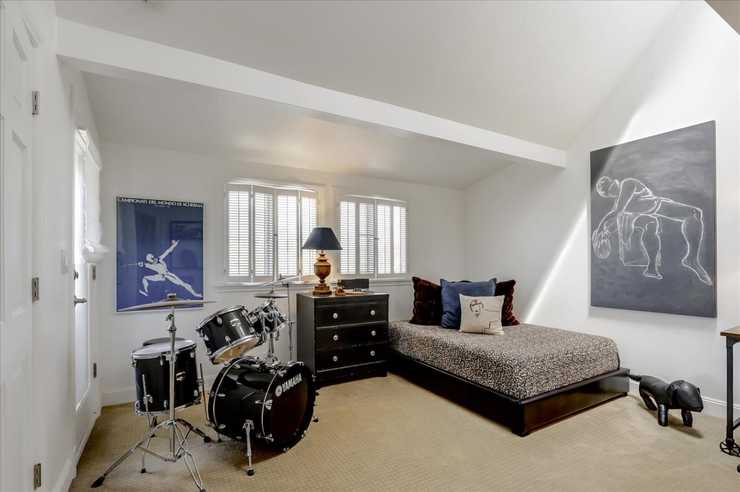 85 Clarendon Road Pacifica, CA 94044 - Photo 55 of 74 a bedroom with furniture and a large window