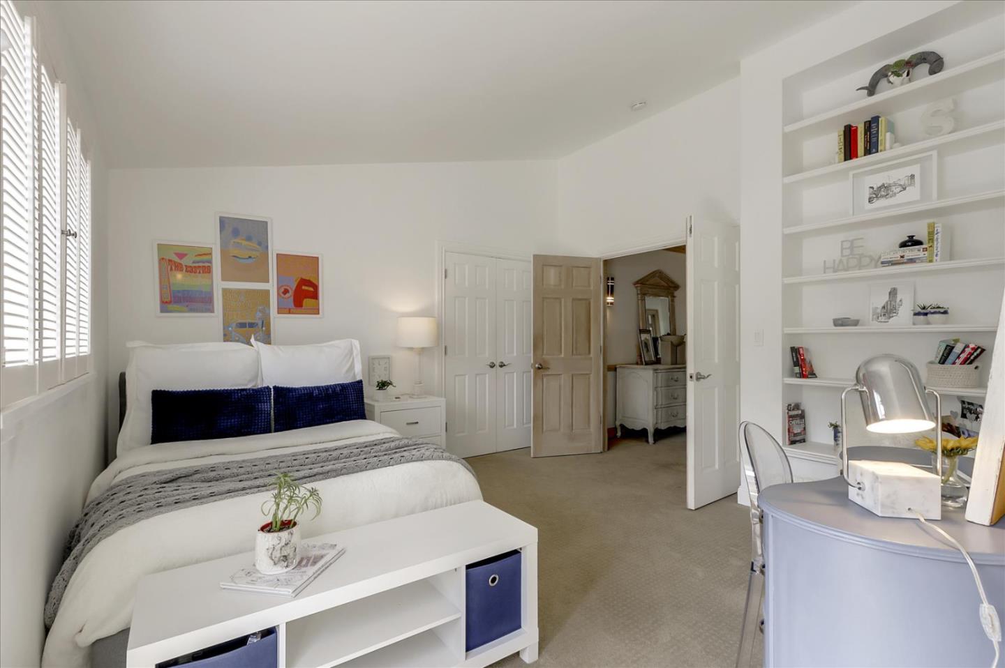 85 Clarendon Road Pacifica, CA 94044 - Photo 56 of 74 a bedroom with a bed and a cabinets