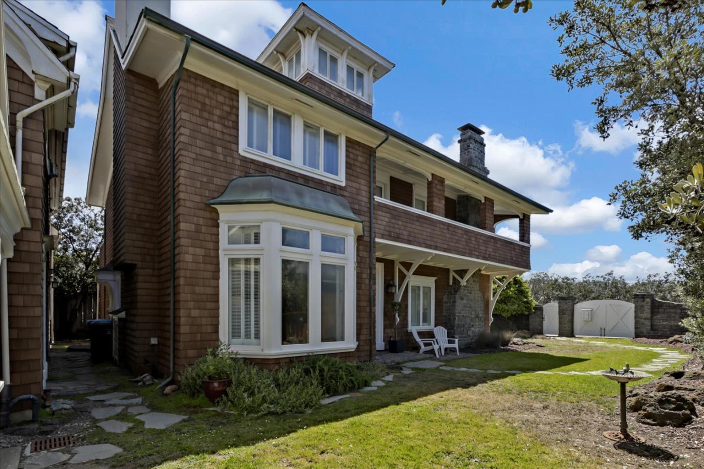 85 Clarendon Road Pacifica, CA 94044 - Photo 8 of 74 a front view of a house with garden and porch