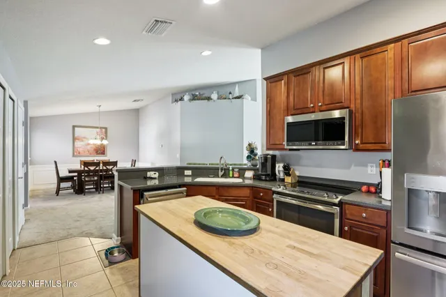 $297,000 | 6604 White Blossom Court, Unit 10H, Jacksonville, FL 32258