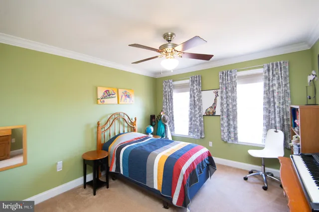 a bathroom with a sink toilet a mirror and shower