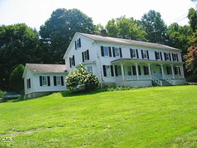 265 Center Road Easton, CT 06612 - Photo 1 of 1 a view of a house with a yard