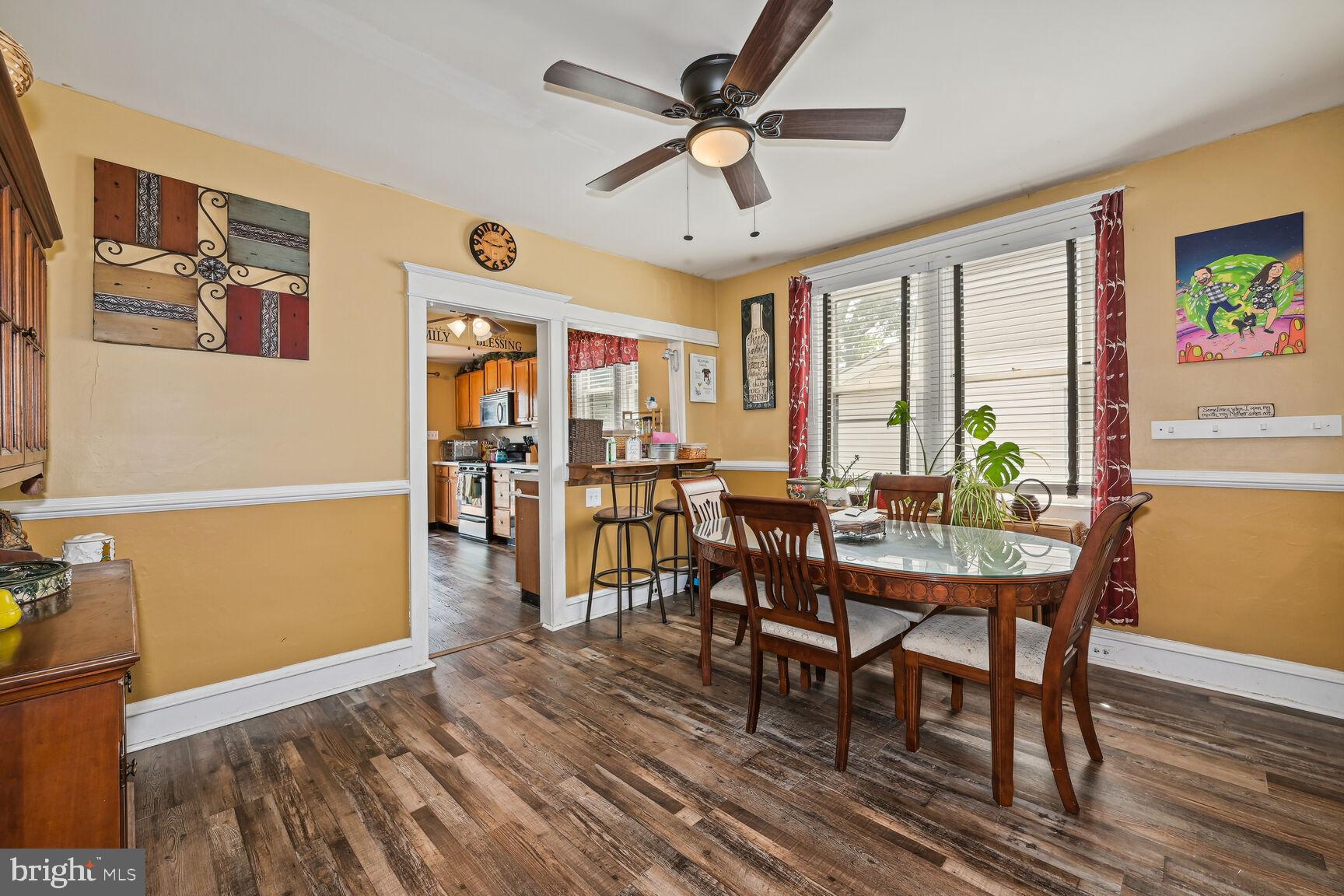 48 Haverford Road Runnemede, NJ 08078 - Photo 11 of 23 a view of a dining room with furniture window and wooden floor