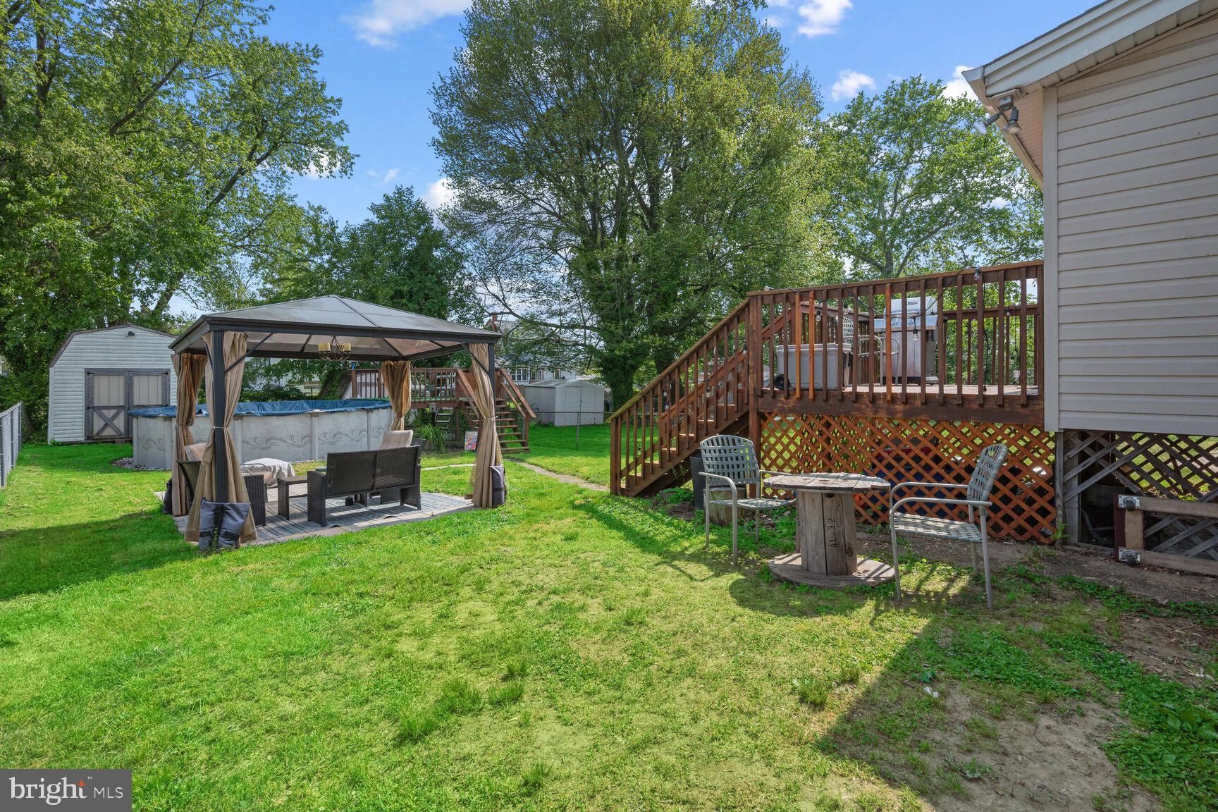 48 Haverford Road Runnemede, NJ 08078 - Photo 20 of 23 a view of a house with backyard sitting area and garden