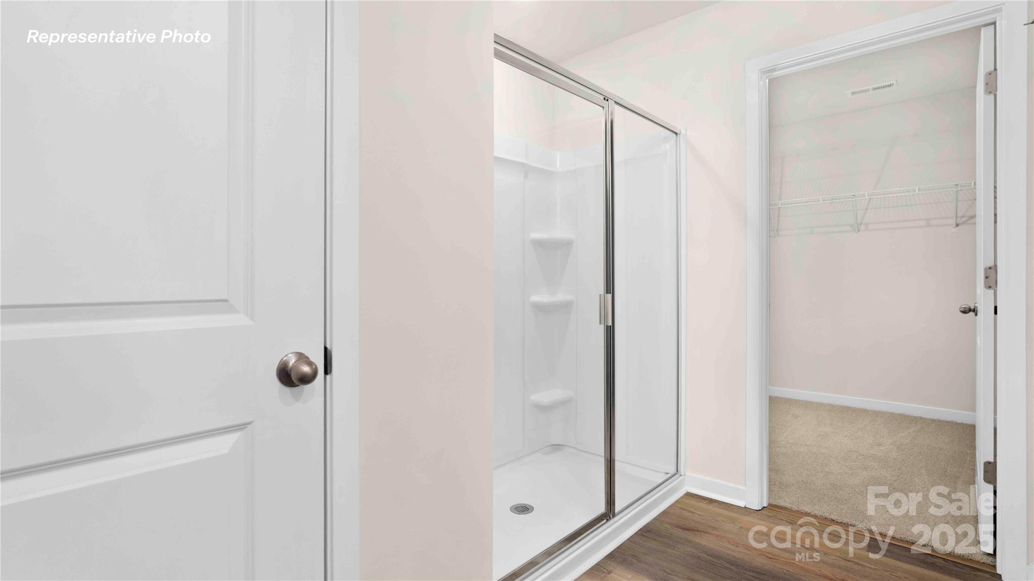 3953 Ashton Drive Northwest Conover, NC 28613 - Photo 23 of 27 a bathroom with a glass shower door