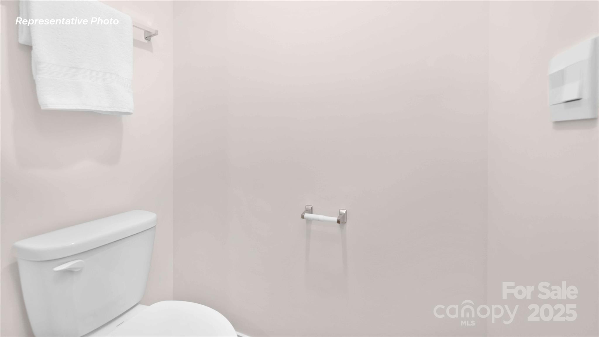 3953 Ashton Drive Northwest Conover, NC 28613 - Photo 24 of 27 a white toilet sitting next to a white sink