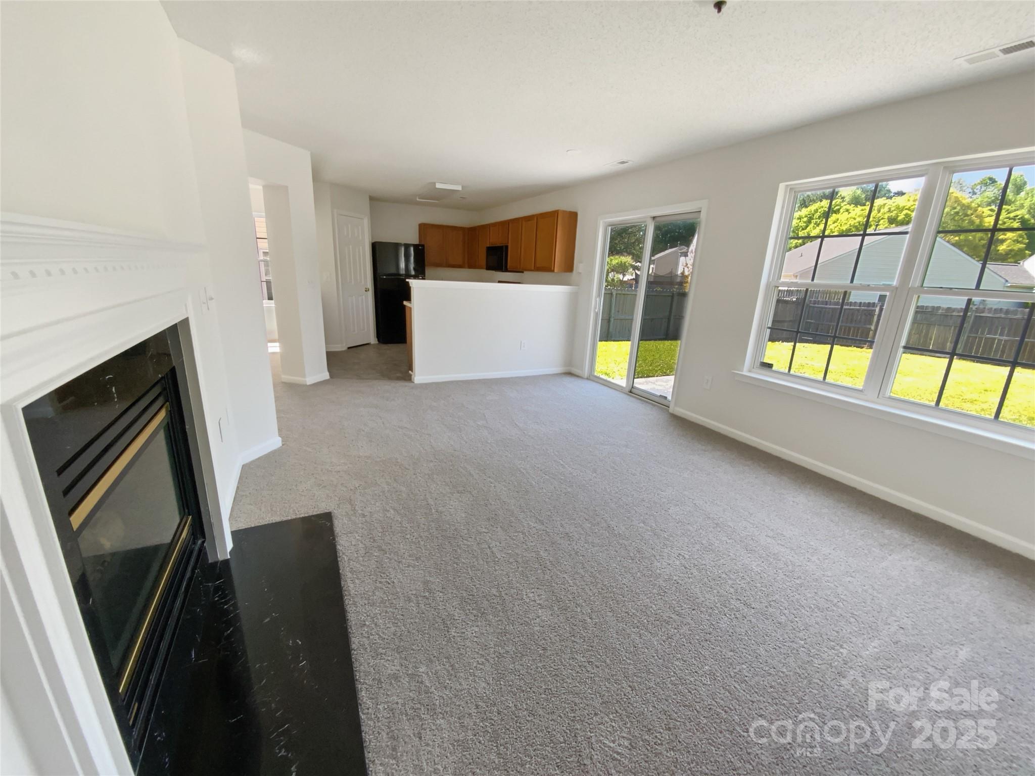 4437 Devonhill Lane Charlotte, NC 28269 - Photo 12 of 18 a view of an empty room with a window