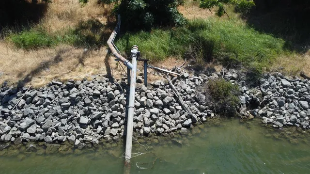 a view of a golf course with a lake