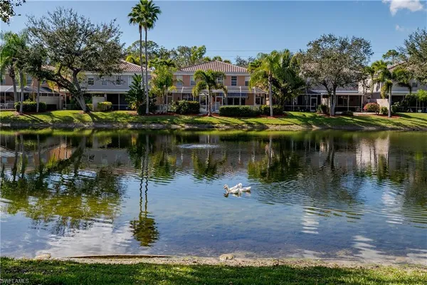 a view of a lake with houses