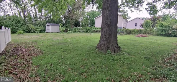 a fire hydrant in the middle of a field