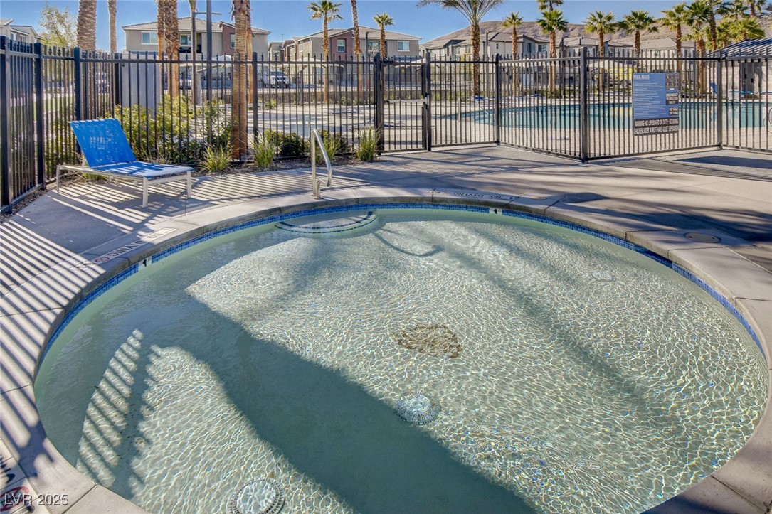 12106 Azure Gate Road, Unit 3 Las Vegas, NV 89183 - Photo 54 of 77 View of swimming pool with a pool, a residential view, a patio, and a community hot tub