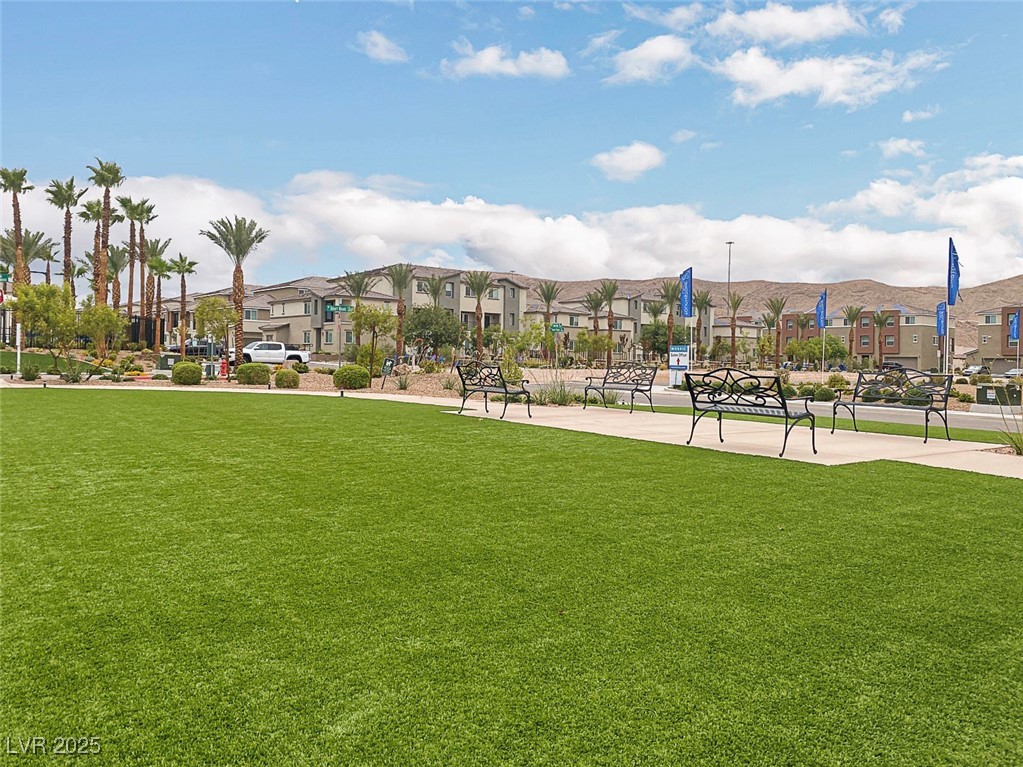 12106 Azure Gate Road, Unit 3 Las Vegas, NV 89183 - Photo 55 of 77 View of property's community featuring a yard and a residential view