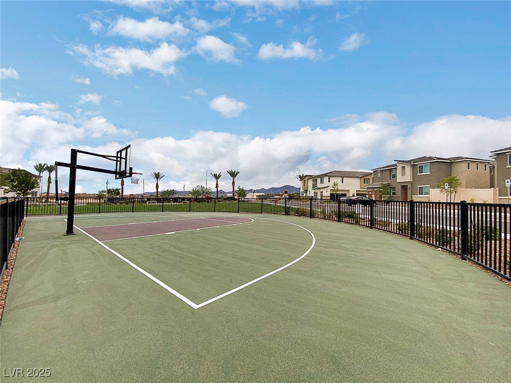 12106 Azure Gate Road, Unit 3 Las Vegas, NV 89183 - Photo 62 of 77 View of basketball court featuring community basketball court and a residential view