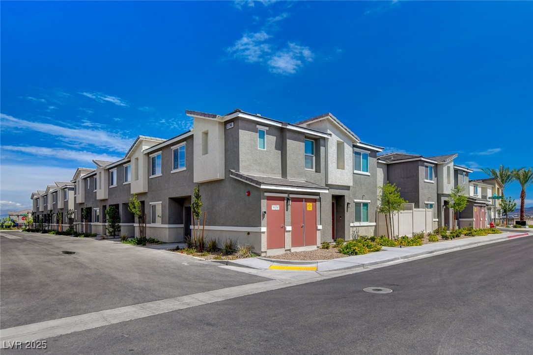 12106 Azure Gate Road, Unit 3 Las Vegas, NV 89183 - Photo 69 of 77 View of front of property featuring a residential view and stucco siding