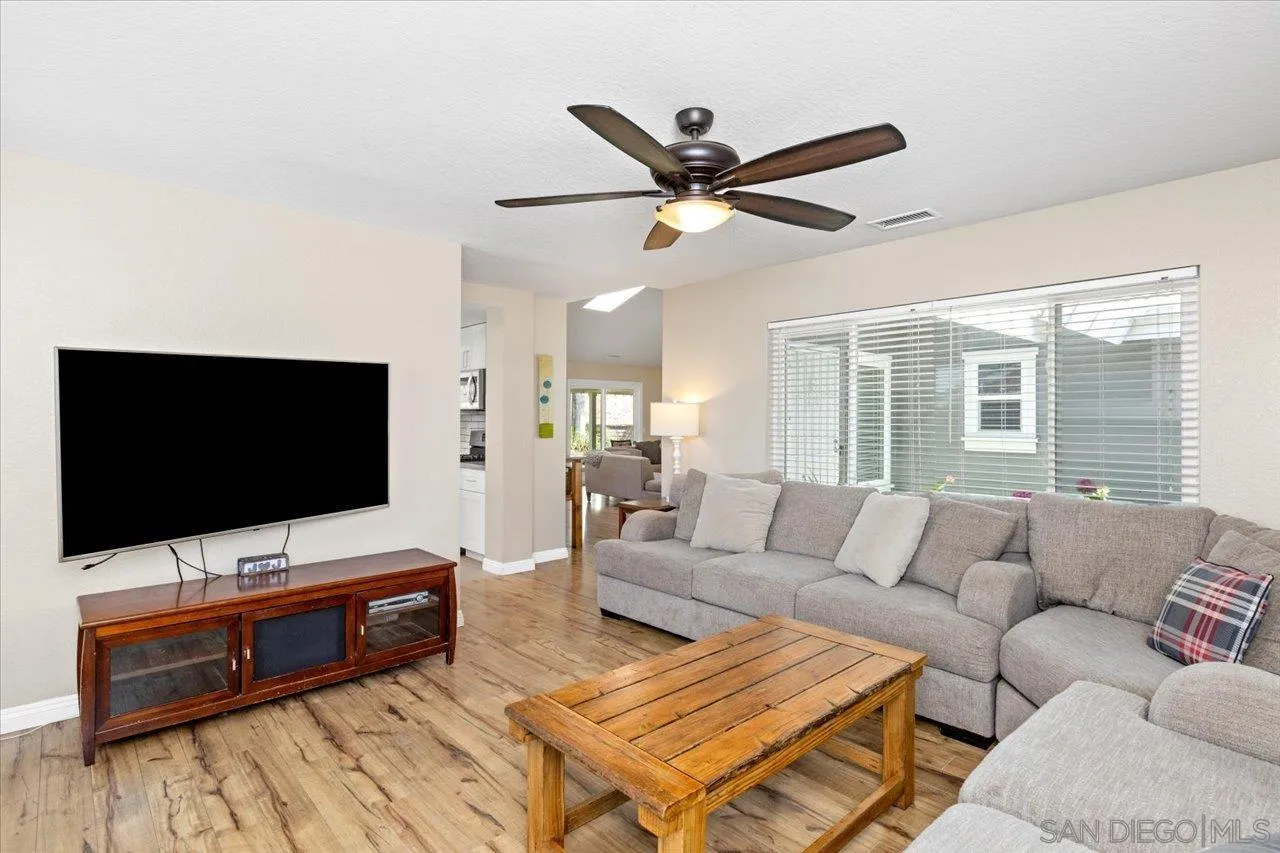 1561 Conway Drive Escondido, CA 92027 - Photo 13 of 41 a living room with furniture and a flat screen tv