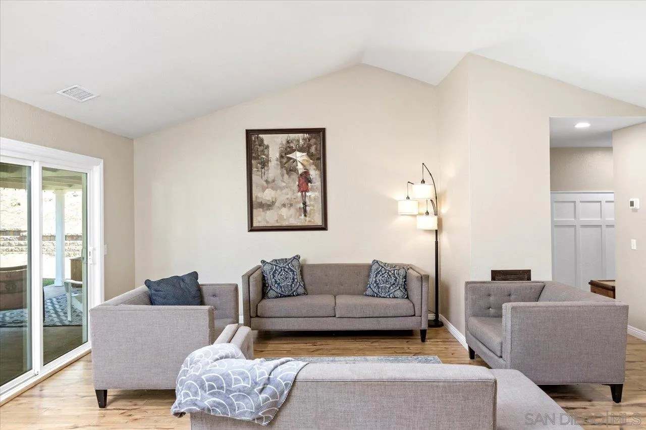1561 Conway Drive Escondido, CA 92027 - Photo 18 of 41 a living room with furniture and a large window