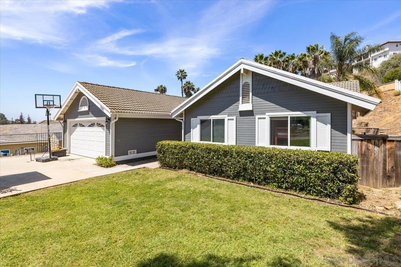1561 Conway Drive Escondido, CA 92027 - Photo 3 of 41 a front view of a house with a garden