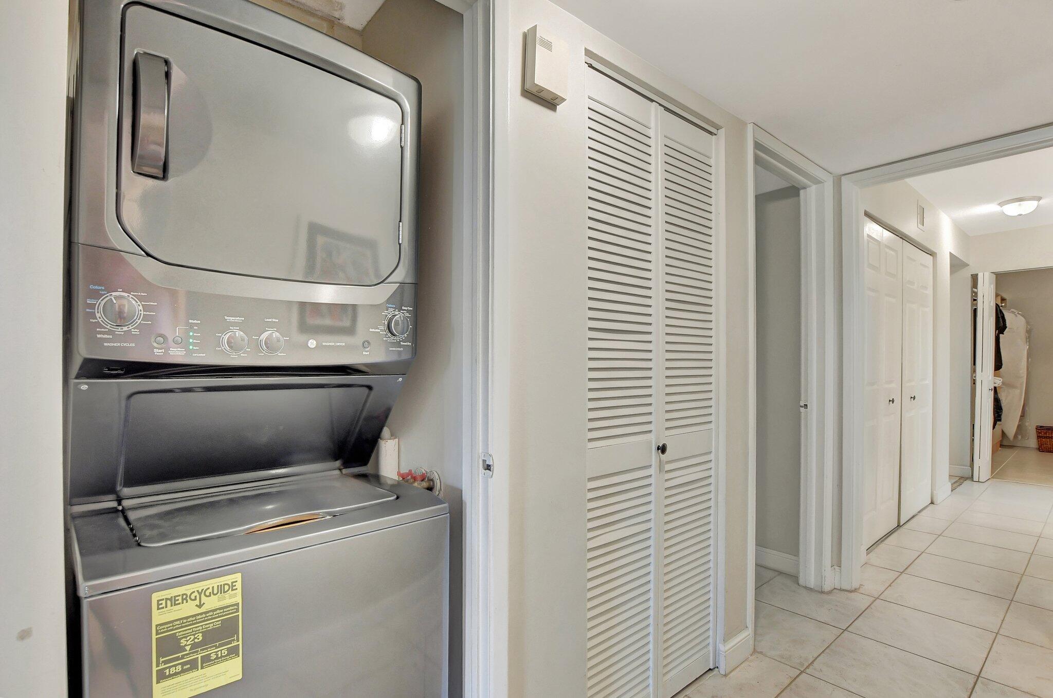 5901 Camino Del Sol, Unit 107 Boca Raton, FL 33433 - Photo 24 of 51 a view of washer and dryer