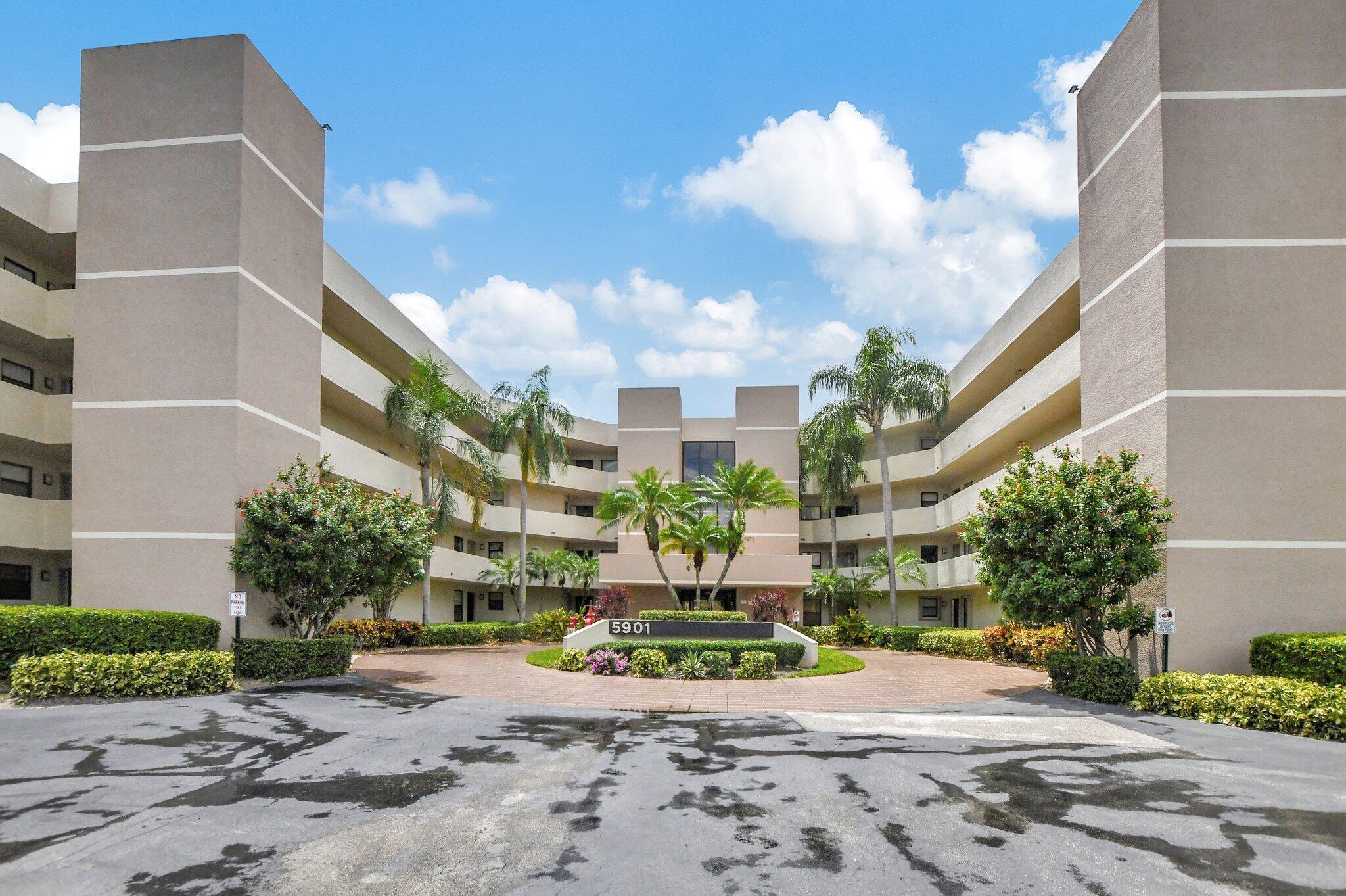 5901 Camino Del Sol, Unit 107 Boca Raton, FL 33433 - Photo 37 of 51 a view of a building