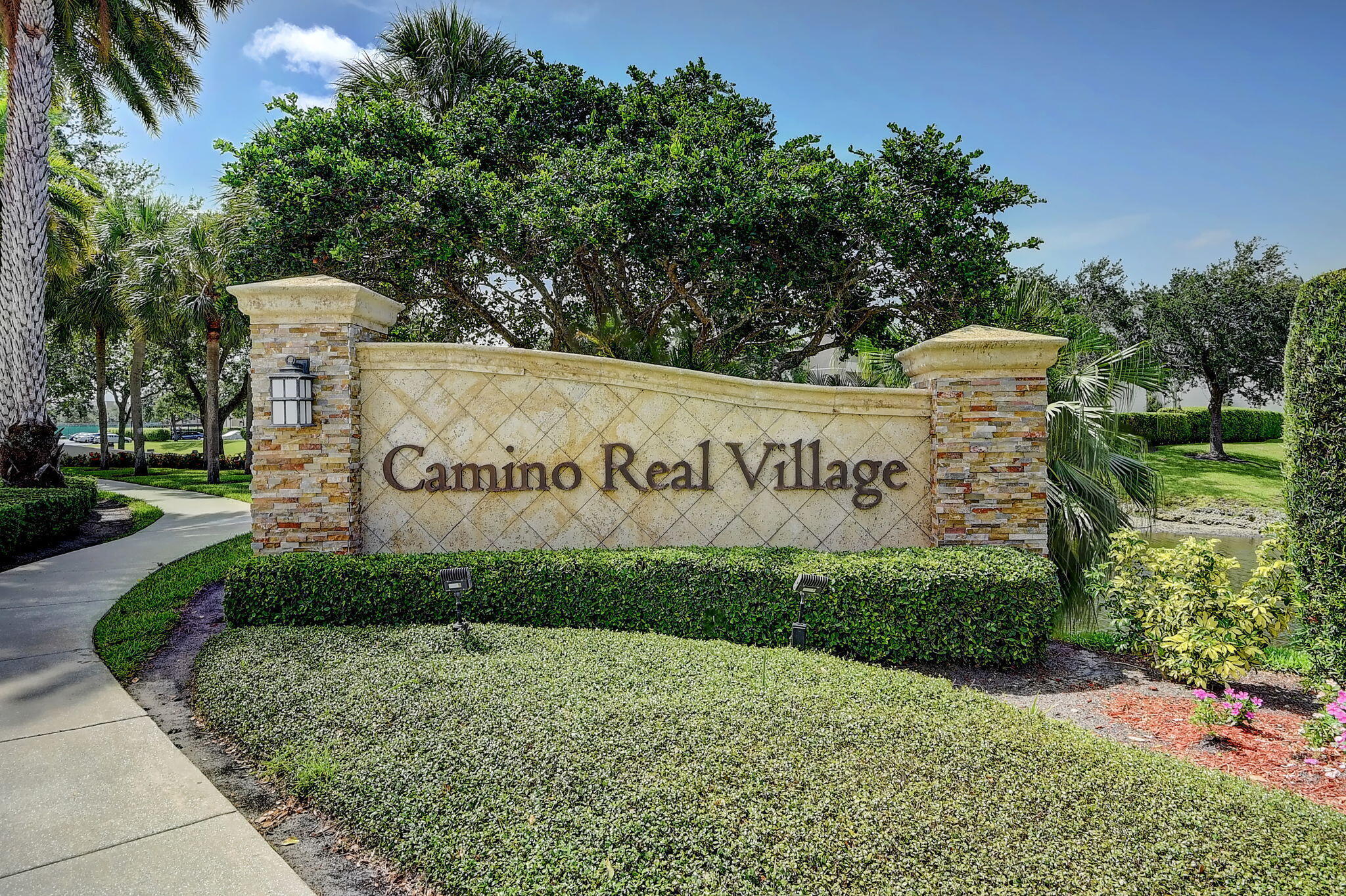 5901 Camino Del Sol, Unit 107 Boca Raton, FL 33433 - Photo 38 of 51 a view of a park with welcome board