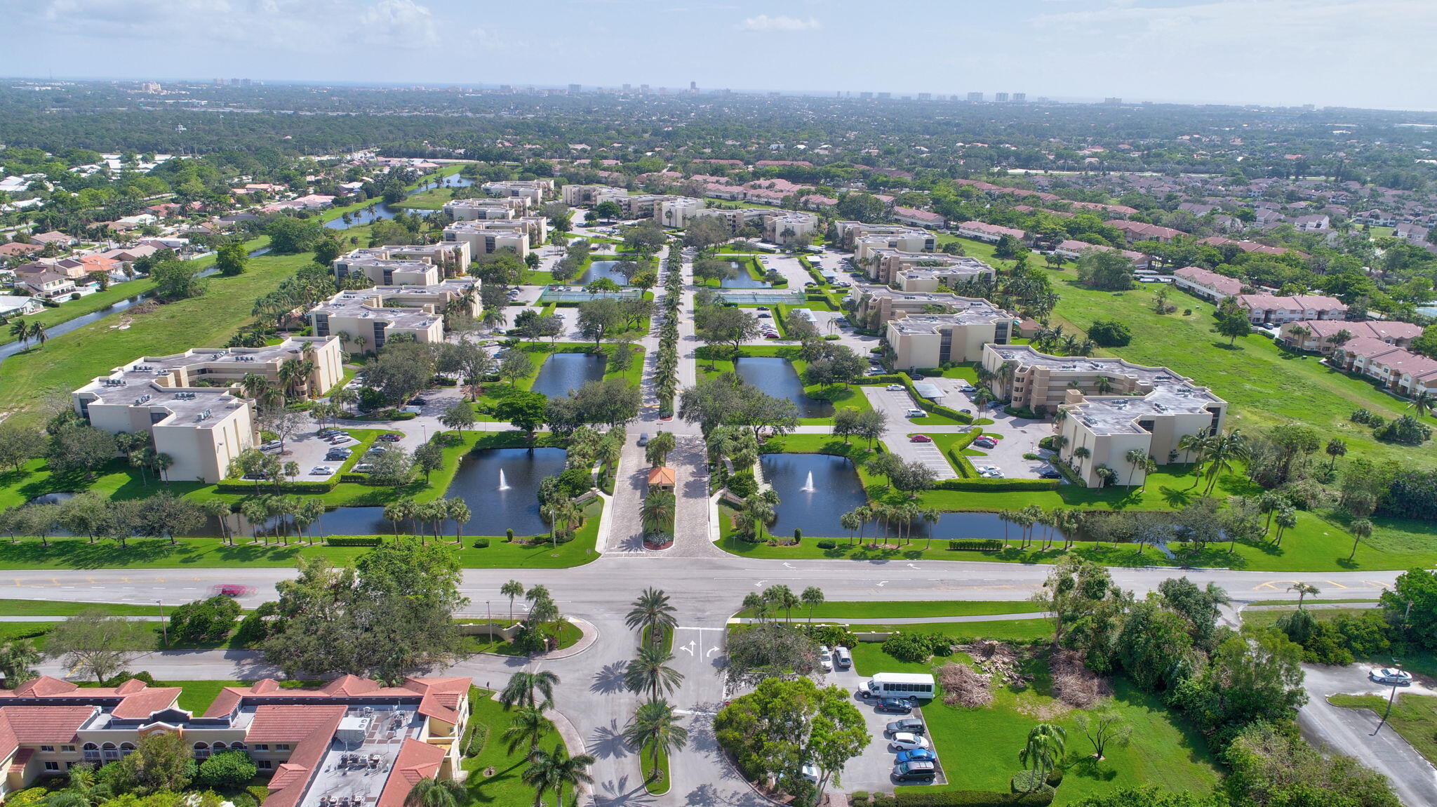5901 Camino Del Sol, Unit 107 Boca Raton, FL 33433 - Photo 40 of 51 an aerial view of multiple house