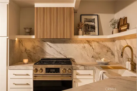 a view of a living room and kitchen
