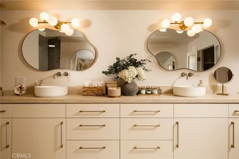 a room with a toilet and mirror