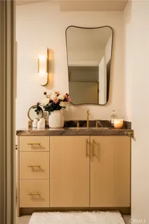 a kitchen with stainless steel appliances granite countertop a sink and cabinets