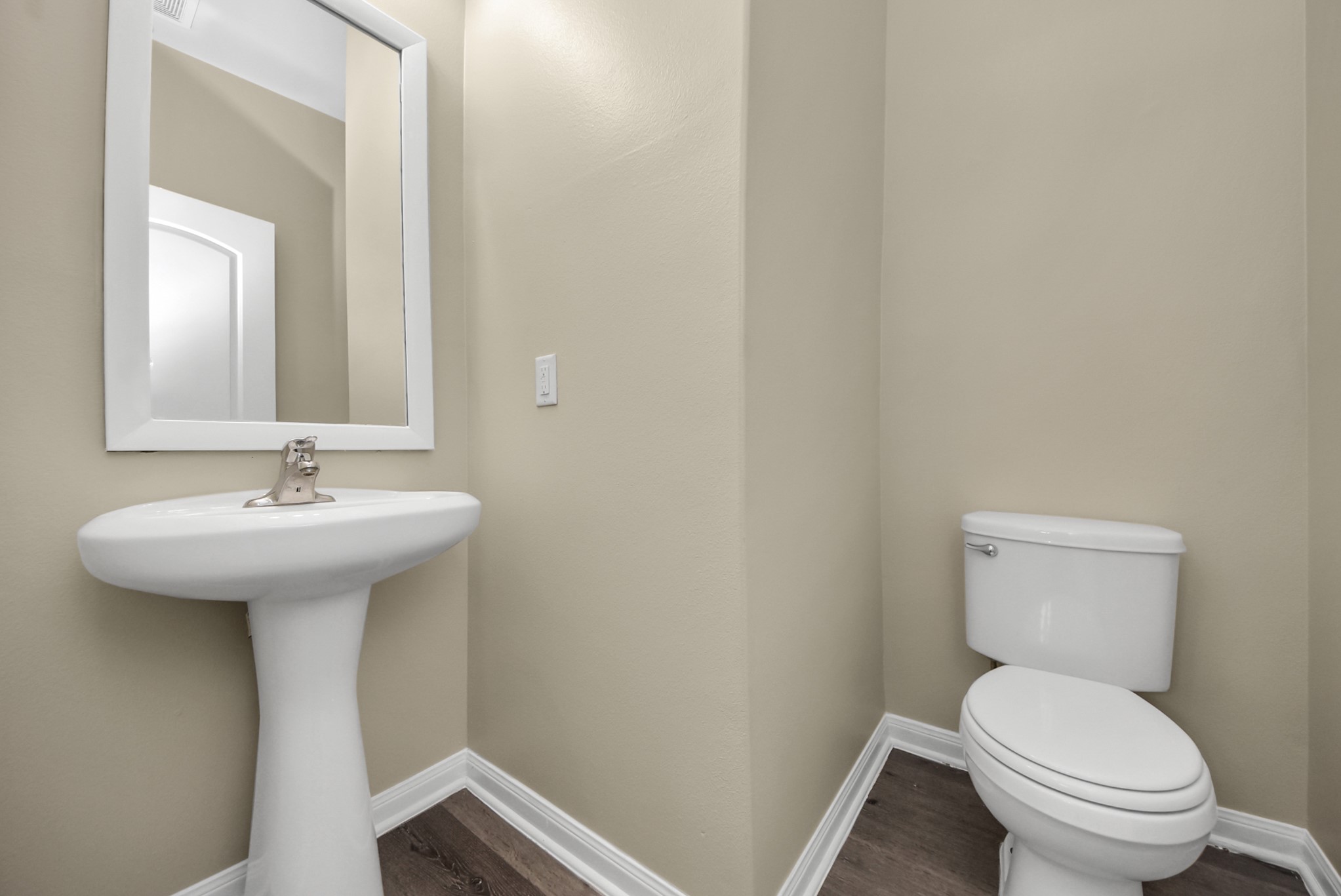 1855 Garnet Breeze Drive Rosharon, TX 77583 - Photo 13 of 40 a bathroom with a sink toilet and a mirror