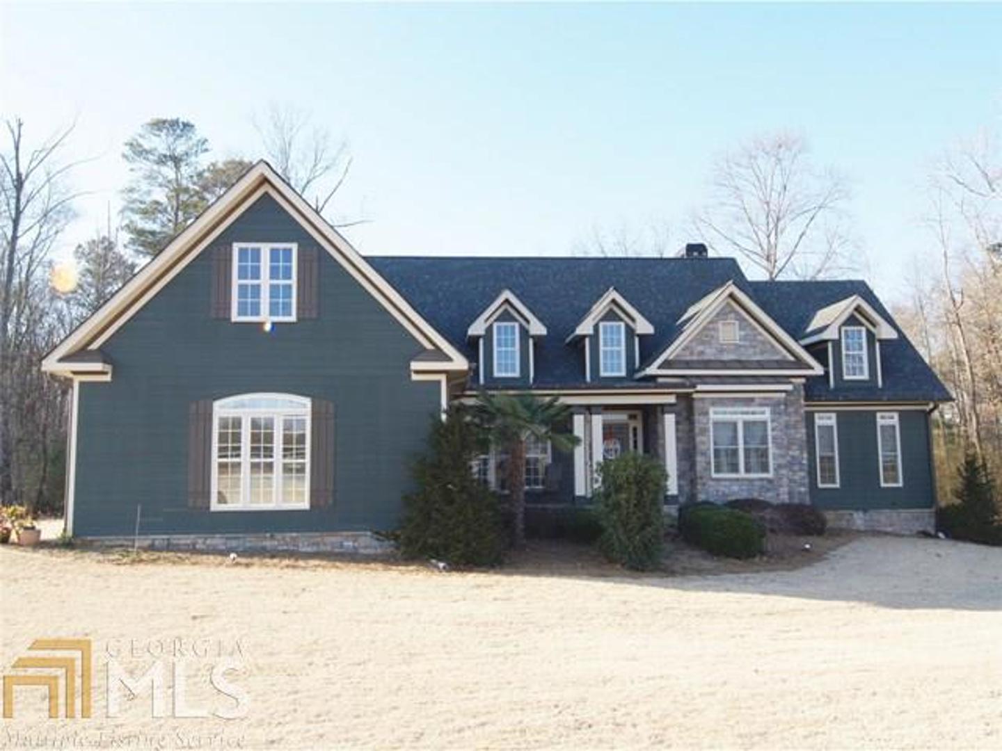 1160 Adair Road Rutledge, GA 30663 - Photo 1 of 1 a front view of a house