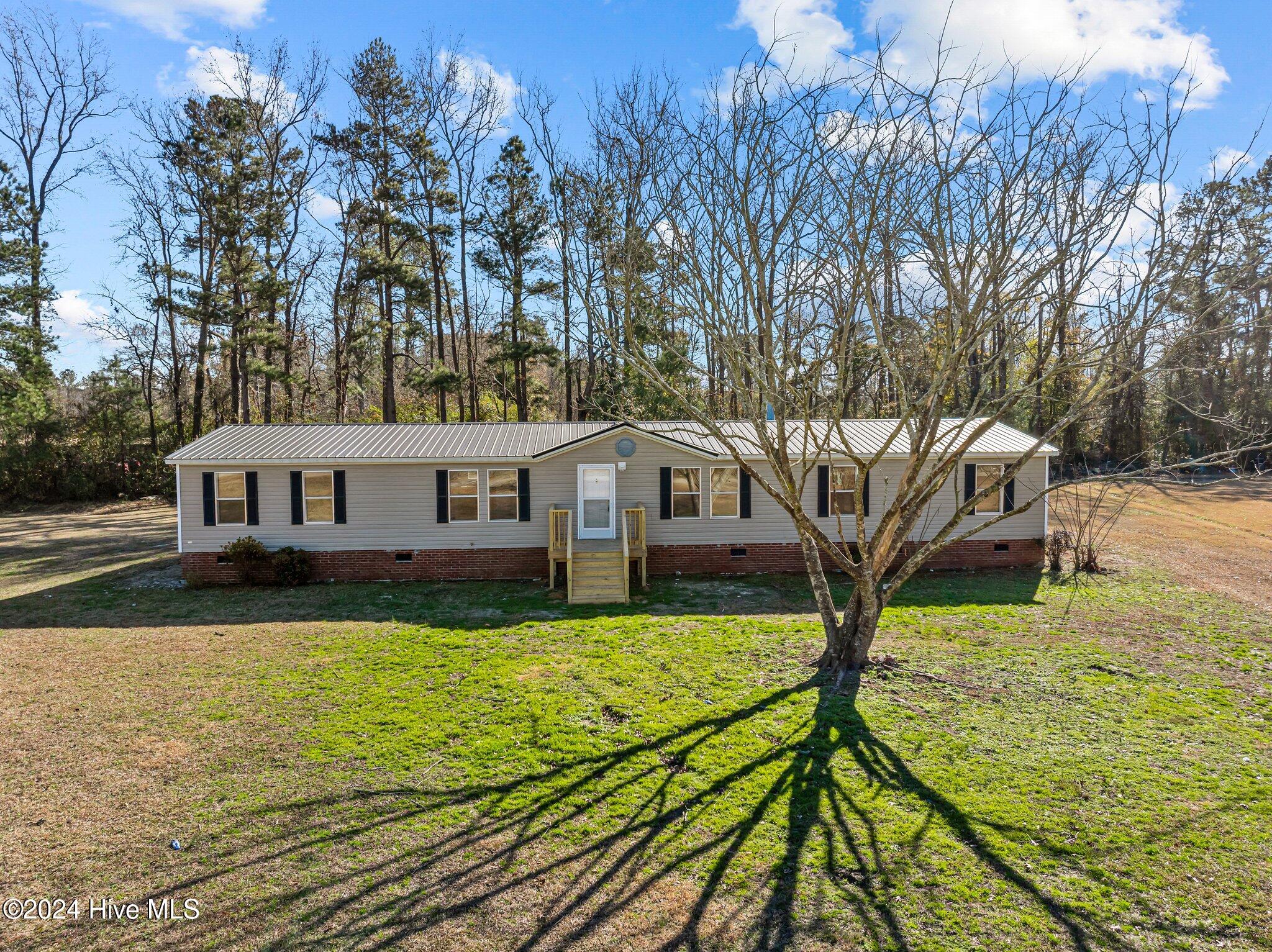 49 Stage Coach Road Ivanhoe, NC 28447 - Photo 3 of 46 14-web-or-mls-DJI_20241223123322_0904_D