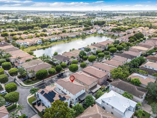 an aerial view of a city with lots of residential buildings