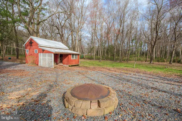 a view of house with outdoor space