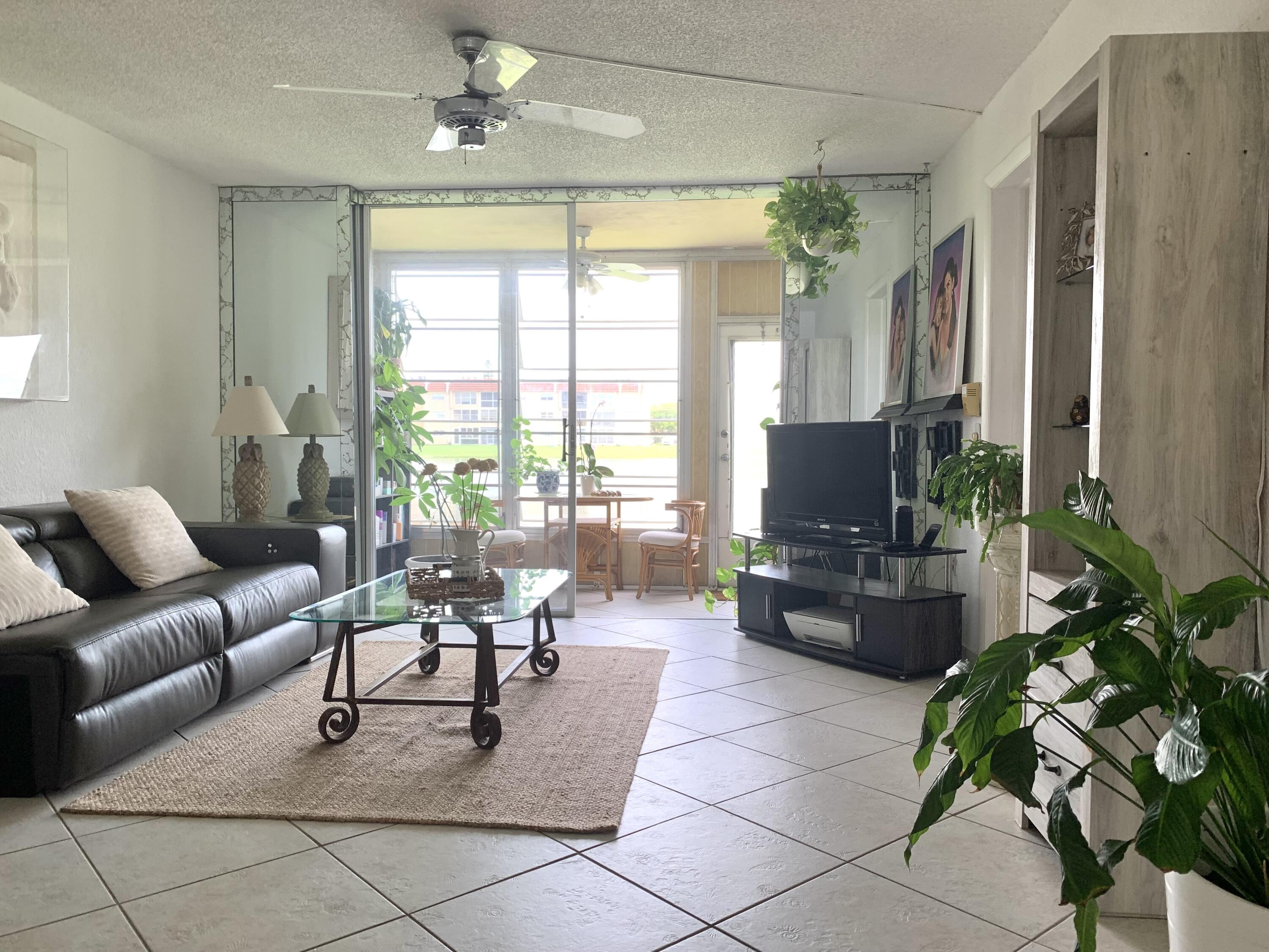 2801 North Pine Island Road, Unit 110 Sunrise, FL 33322 - Photo 4 of 26 IMG_2887 Salotto