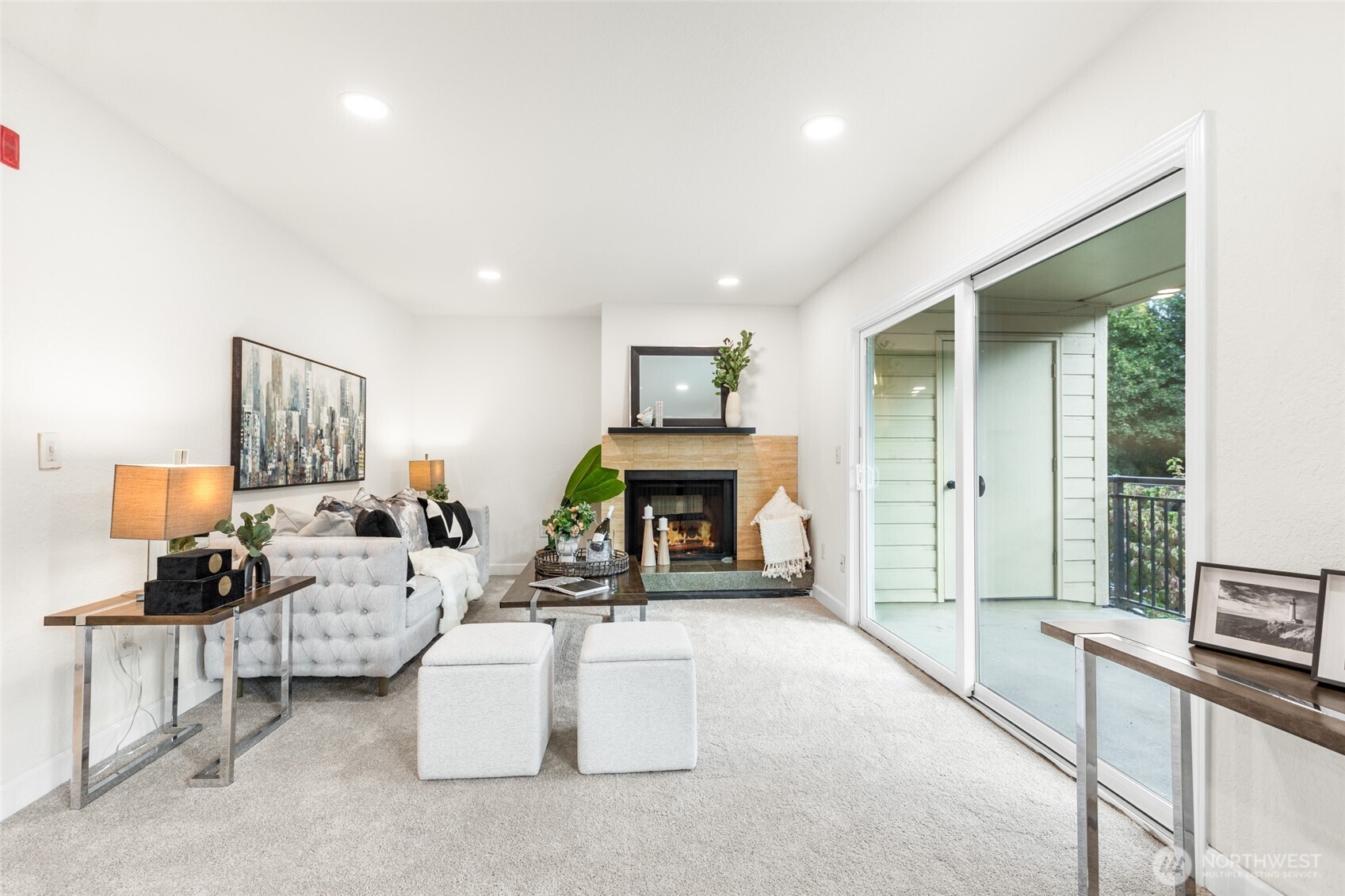 13626 Northeast 7th Street, Unit F10 Bellevue, WA 98005 - Photo 8 of 23 a living room with furniture and a fireplace