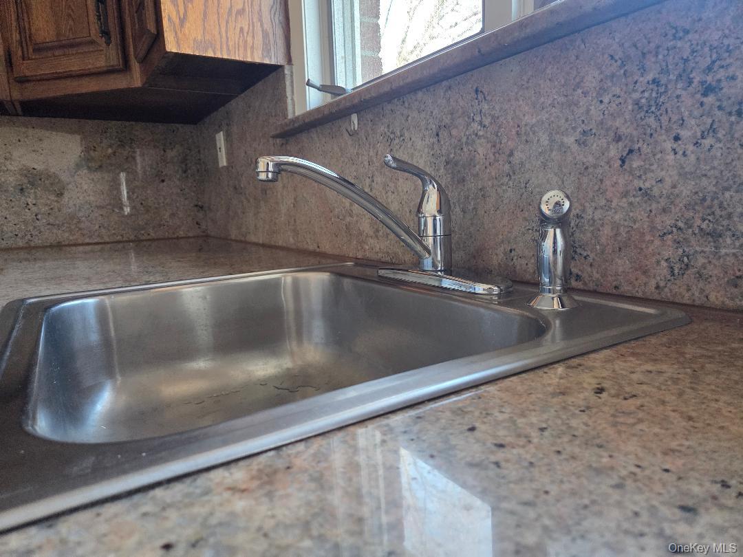 68 Kirkwood Road Port Washington, NY 11050 - Photo 4 of 9 a close view of sink