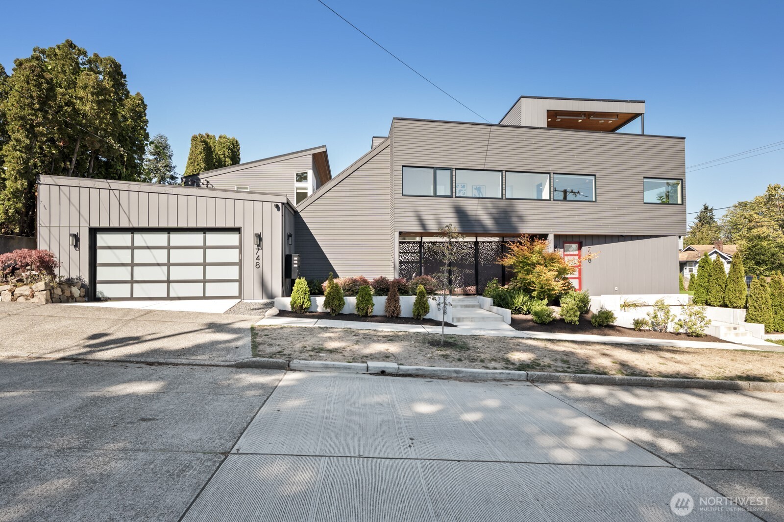 front view of a house with a street