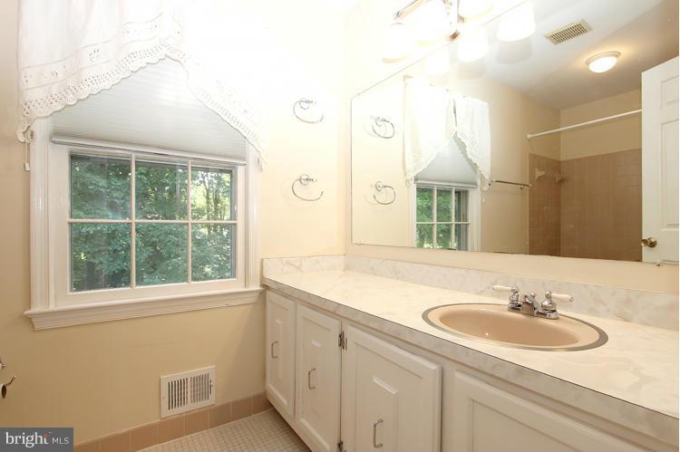 4401 Rendale Court Olney, MD 20832 - Photo 22 of 30 Master Bath with tub