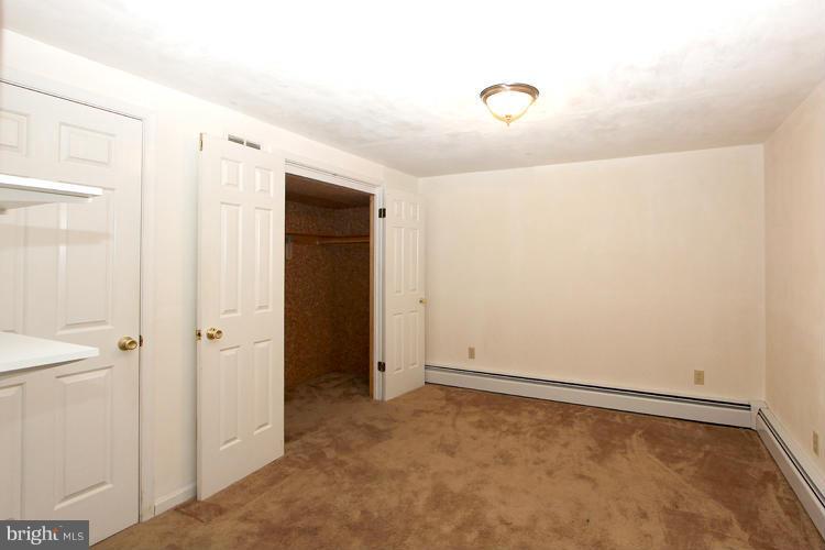 4401 Rendale Court Olney, MD 20832 - Photo 26 of 30 Basement study with cedar closet