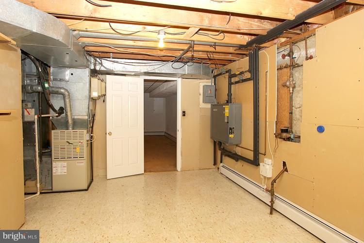 4401 Rendale Court Olney, MD 20832 - Photo 27 of 30 Basement utility and storage room