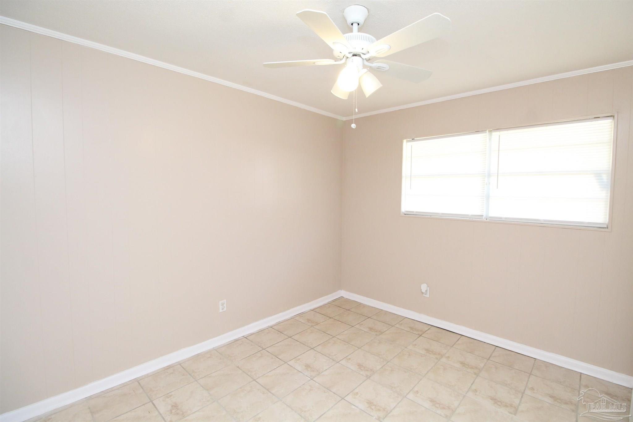6620 Applegate Street Milton, FL 32570 - Photo 11 of 12 an empty room with a window