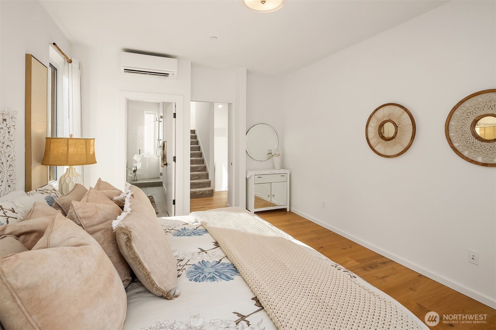 629 13th Avenue East Seattle, WA 98102 - Photo 14 of 36 a bedroom with furniture and a large mirror