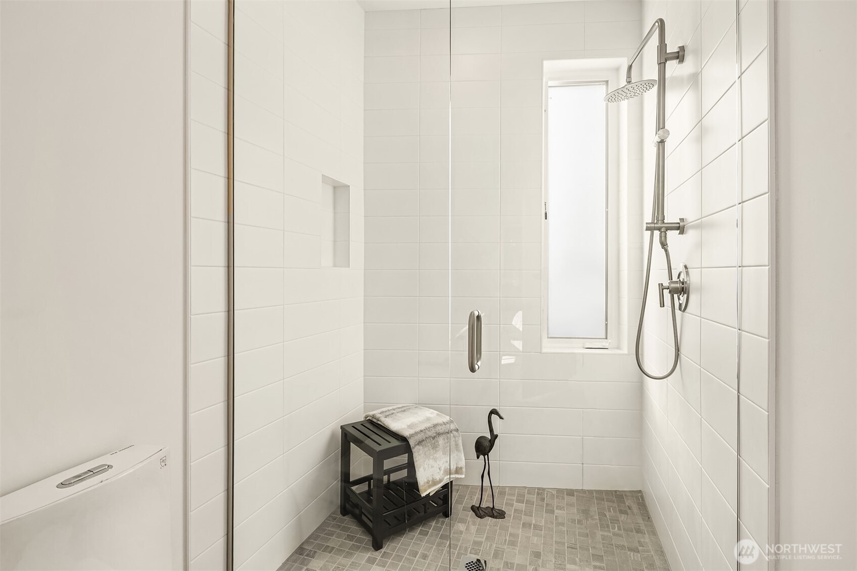 629 13th Avenue East Seattle, WA 98102 - Photo 17 of 36 a bathroom with a granite countertop shower and a sink