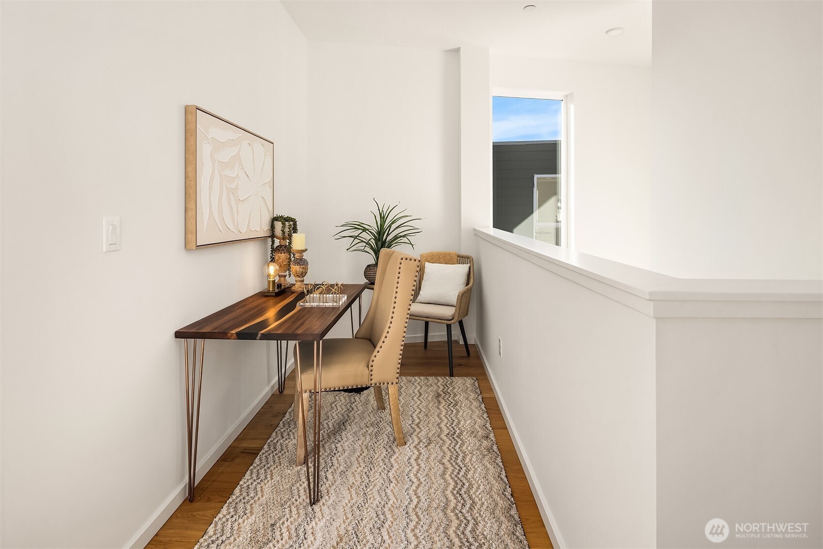 629 13th Avenue East Seattle, WA 98102 - Photo 21 of 36 a balcony with table and chairs