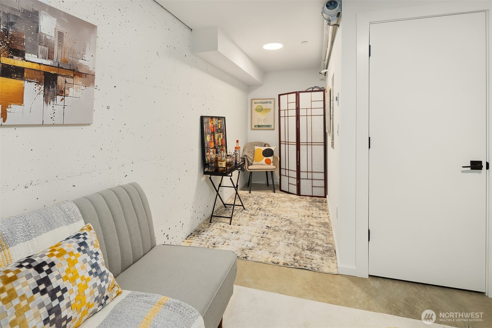 629 13th Avenue East Seattle, WA 98102 - Photo 27 of 36 a living room with furniture and a couch